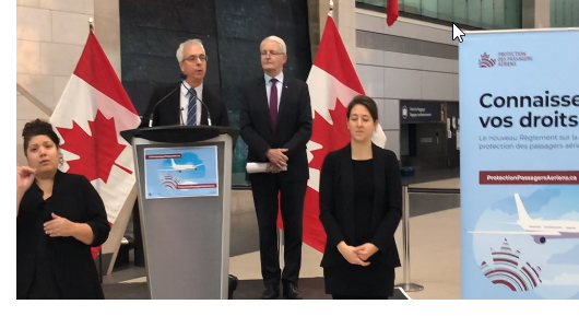 Scott Streiner, Canadian Transportation Agency Chair and CEO, and The Honourable Marc Garneau, Minister of Transport with sign language interpreters at the Ottawa International Airport, December 13, 2019